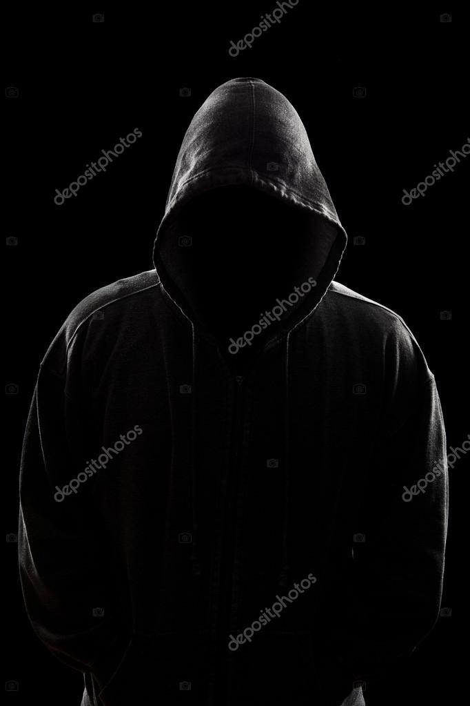 scary man in black hoodie