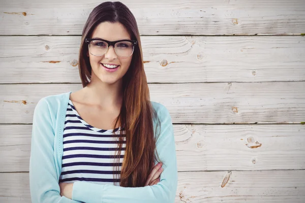 Imagen compuesta de un joven trabajador creativo sonriendo a la cámara —  Fotos de Stock