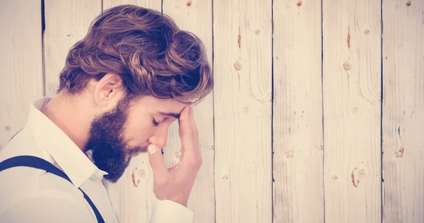 Frustrated hipster with head in hand — Stock Photo, Image