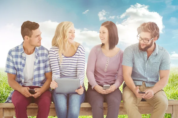 People holding electronic gadgets — Stock Photo, Image