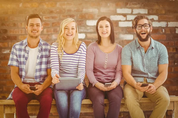 People holding electronic gadgets — Stock Photo, Image