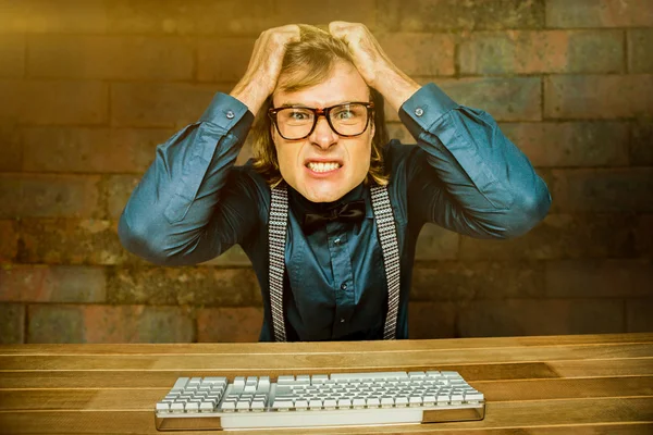 Businessman holding his hair — Stock Photo, Image