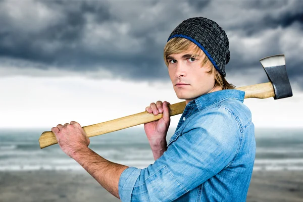 Hipster standing with axe — Stock Photo, Image