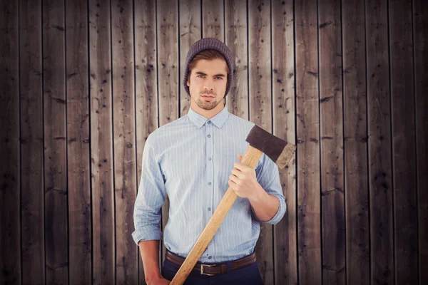 Serious hipster holding axe — Stock Photo, Image