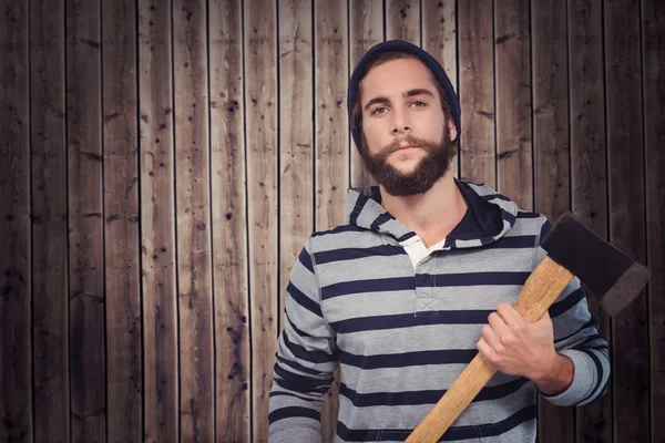 Confident hipster holding axe — Stock Photo, Image