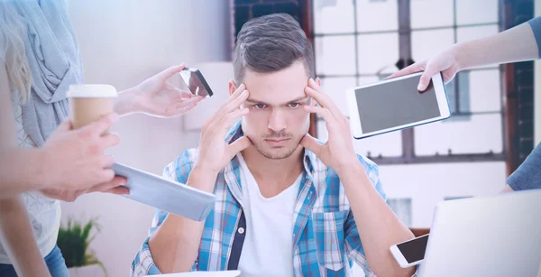 Businessman with head in hands — Stock Photo, Image