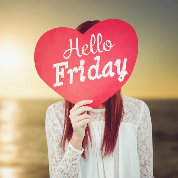 Woman behind a big red heart — Stock Photo, Image