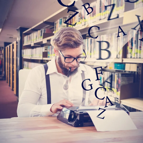 Hipster smoking pipe while working — Stock Photo, Image