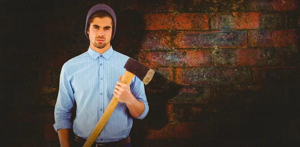 Serious hipster holding axe — Stock Photo, Image