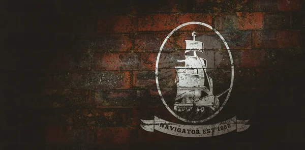 Statek ikona wobec faktura cegły ściany — Zdjęcie stockowe