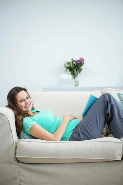Pregnant woman reading a book — Stock Photo, Image