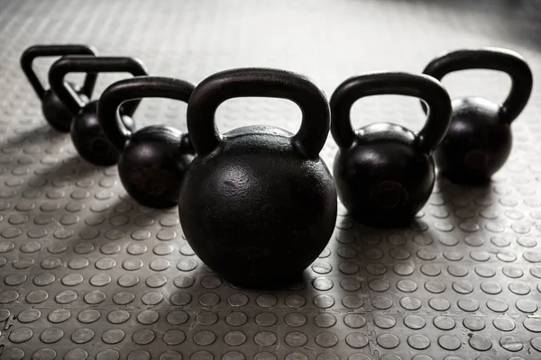 Kettlebells at the gym — Stock Photo, Image