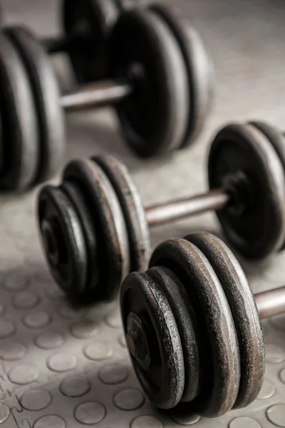 Heavy dumbbells at the gym — Stock Photo, Image