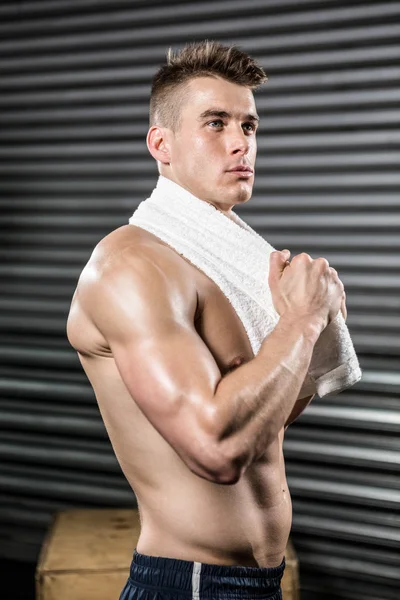 Shirtless man with towel around neck — Stock Photo, Image