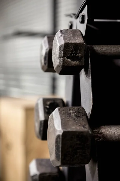 Close up of dumbbells rack — Stock Photo, Image