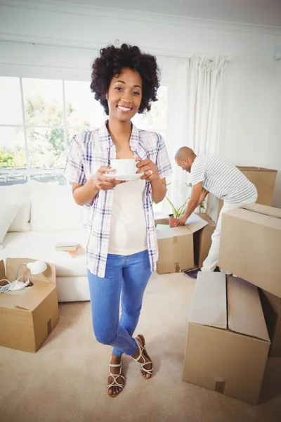 Happy woman holding cup — Stock Photo, Image