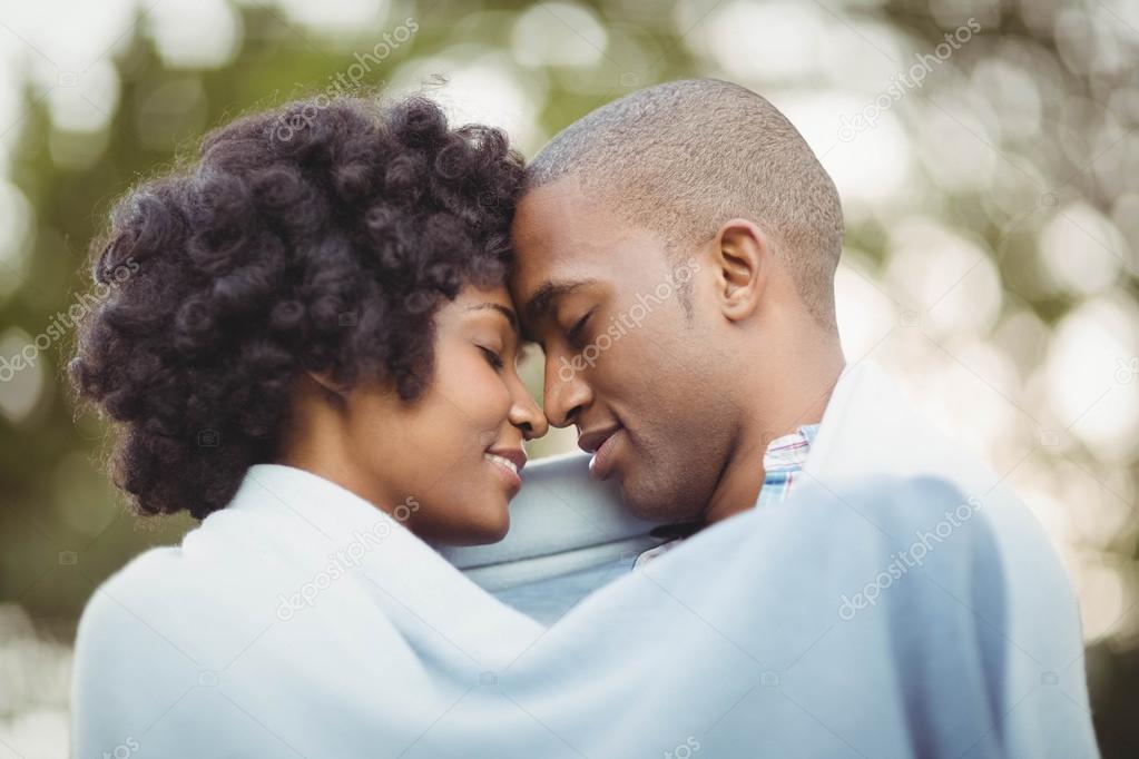 Couple standing nose to nose Stock Photo by ©Wavebreakmedia 100453560