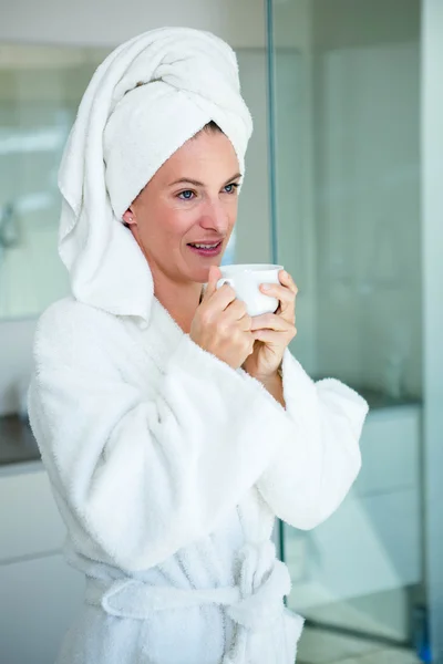 Woman wearing a dressing gown — Stock Photo, Image