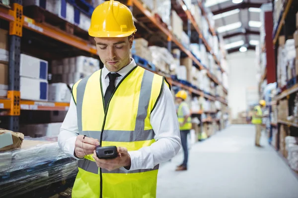 Portrait of smiling warehouse manager — Stock Photo, Image