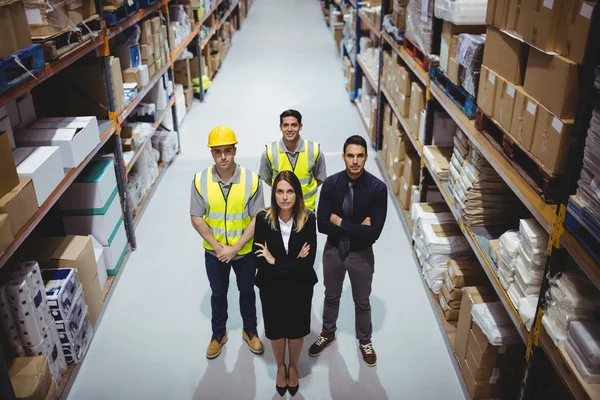 Portrait of warehouse manager and workers — Stock Photo, Image