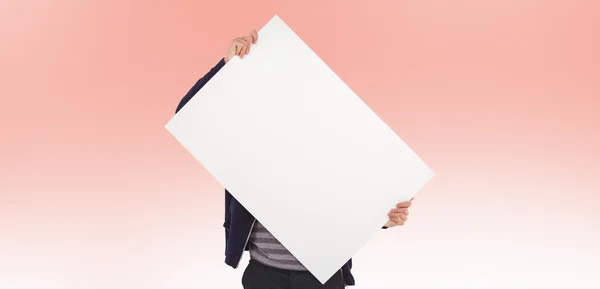 Man holding billboard in front of face — Stock Photo, Image