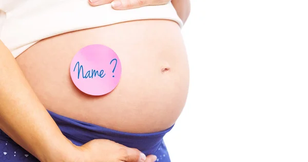 Pregnant woman with sticker on bump — Stock Photo, Image