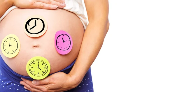 Pregnant woman with stickers on bump — Stock Photo, Image