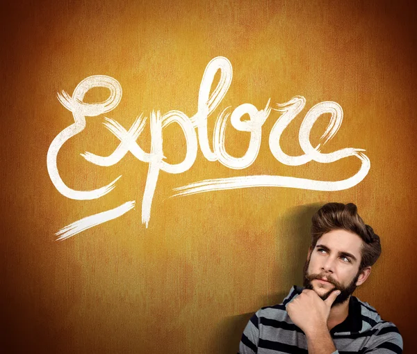 Thoughtful hipster with hand on chin — Stock Photo, Image