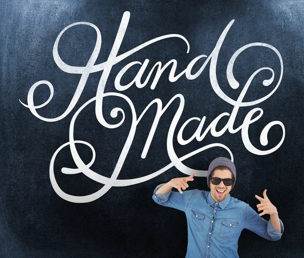 Hipster visar rockn'roll hand tecken — Stockfoto