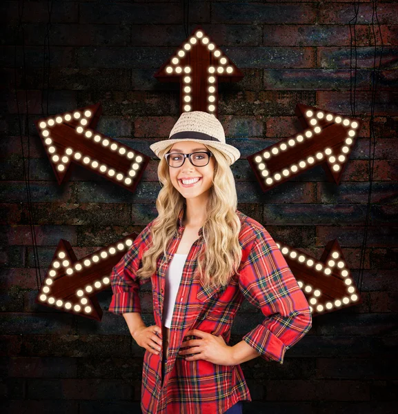 Blonde hipster with hands on hips — Stock Photo, Image