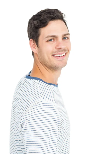 Jeune homme souriant à la caméra — Photo