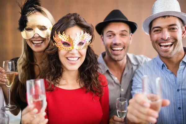 Friends holding champagne glasses — Stock Photo, Image
