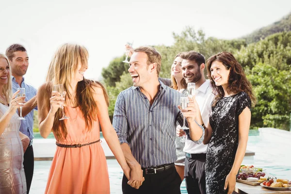 Happy friends having drinks — Stock Photo, Image