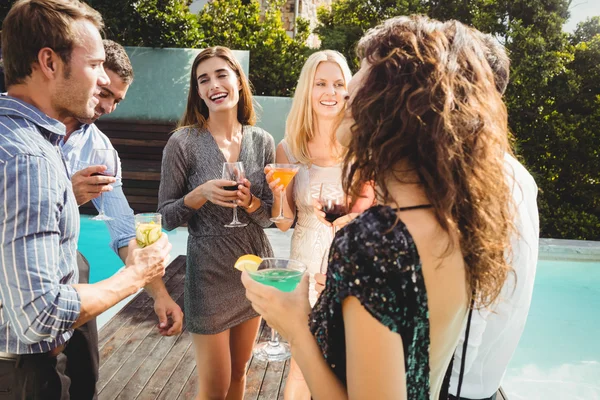 Happy friends having drinks — Stock Photo, Image