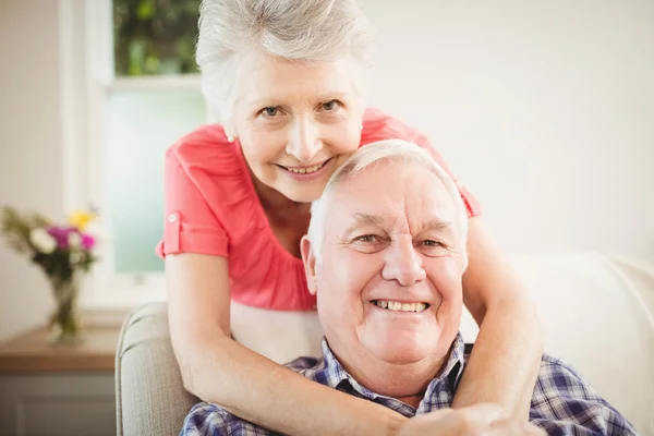 Senior woman embracing man — Stock Photo, Image