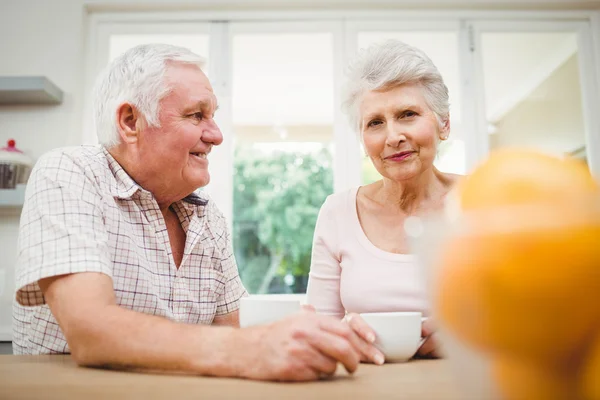 Senior couple talking to each other — Stock Photo, Image