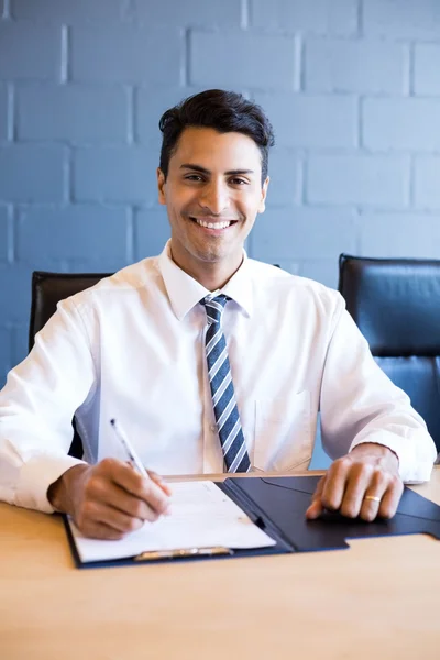 Young businessman in business meeting — Stock Photo, Image