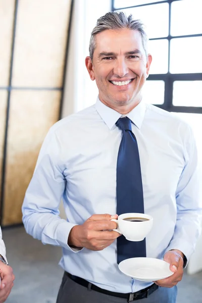 Business executive having a cup of tea — Stock Photo, Image