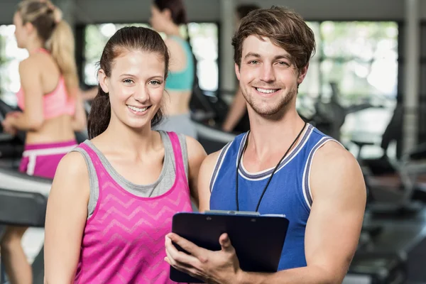 Male trainer discussing about performance — Stock Photo, Image