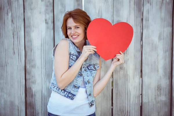 Hipster woman holding heart — Stock Photo, Image