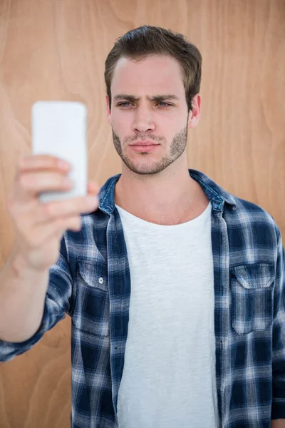 Handsome hipster taking selfie — Stock Photo, Image
