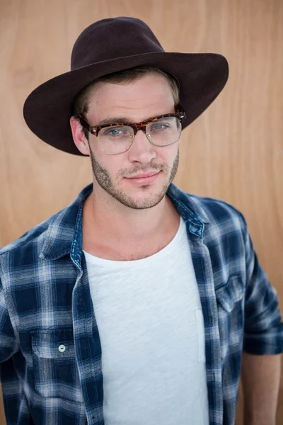 Hipster wearing nerd glasses and hat — Stock Photo, Image