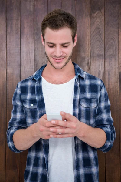 Handsome hipster looking at selfie — Stock Photo, Image