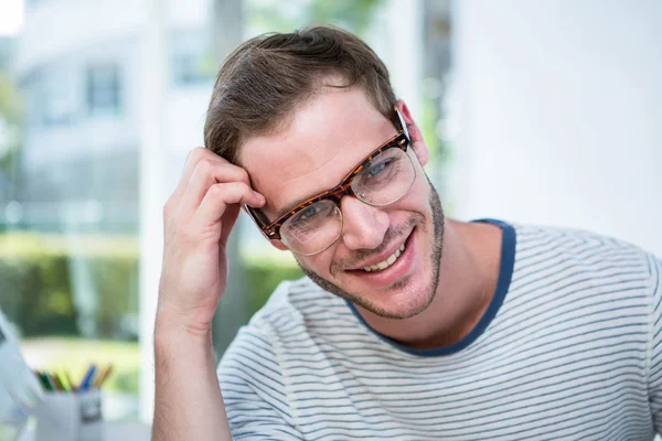 Man working resting on desk — Stock Photo, Image