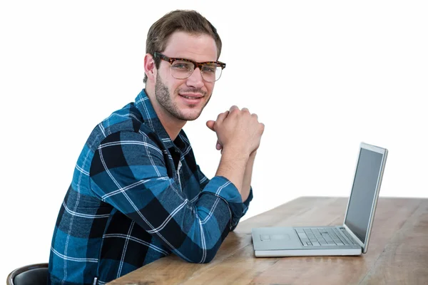 Handsome man working on laptop — Stock Photo, Image