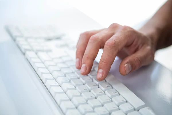 Male hand typing on keyboard — Stock Photo, Image