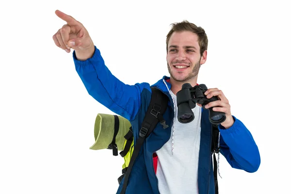 Backpacker hipster pekar — Stockfoto
