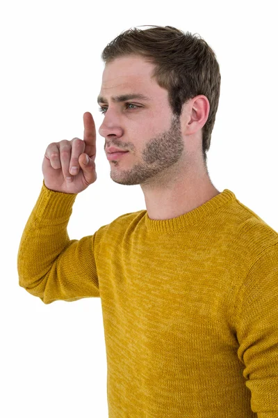 Hipster man wijzen in lucht — Stockfoto