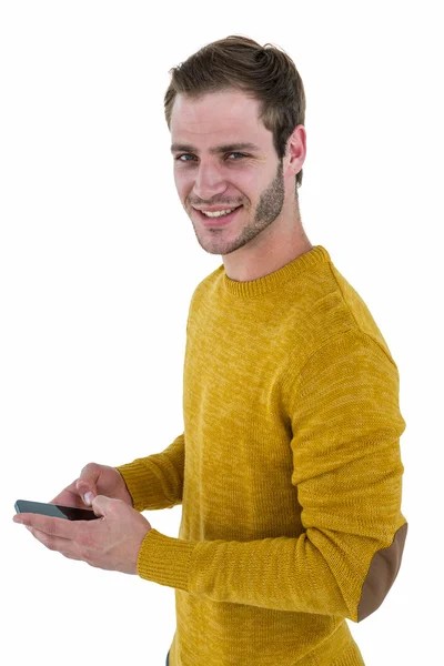 Hipster man att skriva på smartphone — Stockfoto