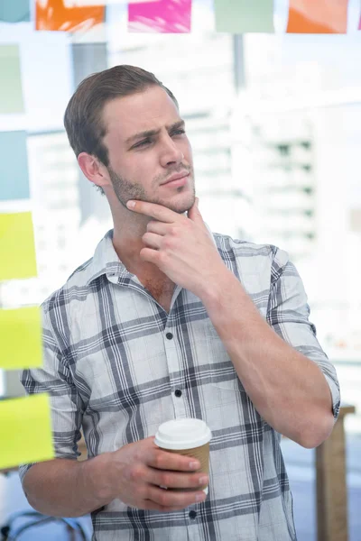 Thoughtful hipster man with coffee — Stock Photo, Image